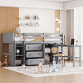 Lit mezzanine bas pour une personne en bois gris avec bureau coulissant et tiroirs